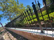 Stronghold Iron Fence in Classic Style Mounted on a Wall Top