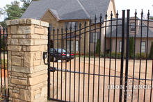 GTO PRO Automatic Gate Opener with Keypad Mounted on Stone Pillar