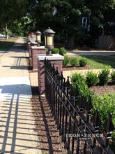 Signature Grade Stronghold Iron Fence in Custom Staggered Picket Style