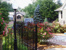 Iron hoop and picket style fence in a 4ft height and Traditional grade