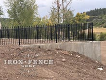4ft Tall Classic Style Signature Grade Iron Fence on a Wall
