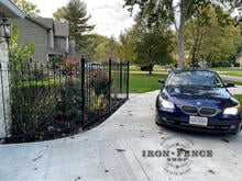 5ft Tall Stronghold Iron Fence in Classic Style Angled Along a Driveway