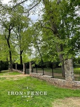 6ft Tall Classic Iron Fence Step Installed Down a Wall Top