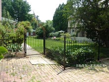 4ft Tall Stronghold Iron Fence in Puppy Picket Style