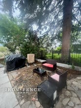 Classic Style Aluminum Fence Installed on a Patio Wall 