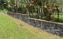 3ft Tall Infinity Aluminum Fence Mounted on a Stone Wall Top