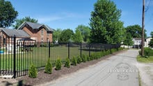 Stair-Step Installed 6ft Tall Iron Fence in Classic Style and Signature Grade