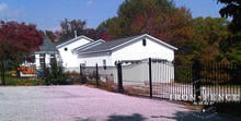 16ft Wide Arched Iron Estate Gate with Matching Iron Fence (5ft Tall)