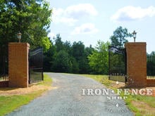 16ft Wide Wrought Iron Driveway Gate with Brick Columns (6' Arching to 7' Tall Gate)